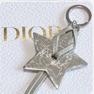 DIOR Silver Star Keychain with Map Design and Taupe Colored Leather.